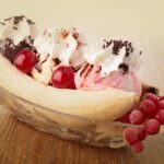 Por que o nome banana split? Qual é o valor de uma banana split? Onde foi criado a banana split? Qual é a posição da banana split?