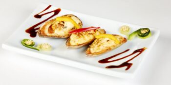 Ostras assadas com queijo brie