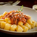 Nhoque a bolonhesa: como fazer o mais econômico? [receita]