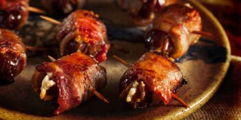 Tâmaras enroladas com bacon