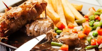 Enroladinho de carne de porco e tomate seco