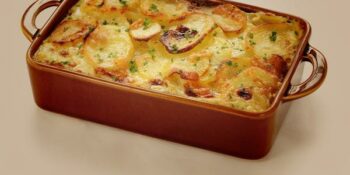 Batata gratinada com queijo e presunto