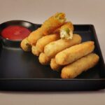 Receita de croquete com milho crocante por fora e macia por dentro