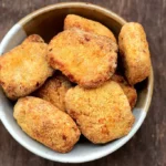 Nugget de frango caseiro - Imagem por Mel e Pimenta