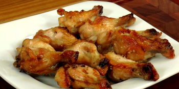 Coxas de frango com creme de cebola