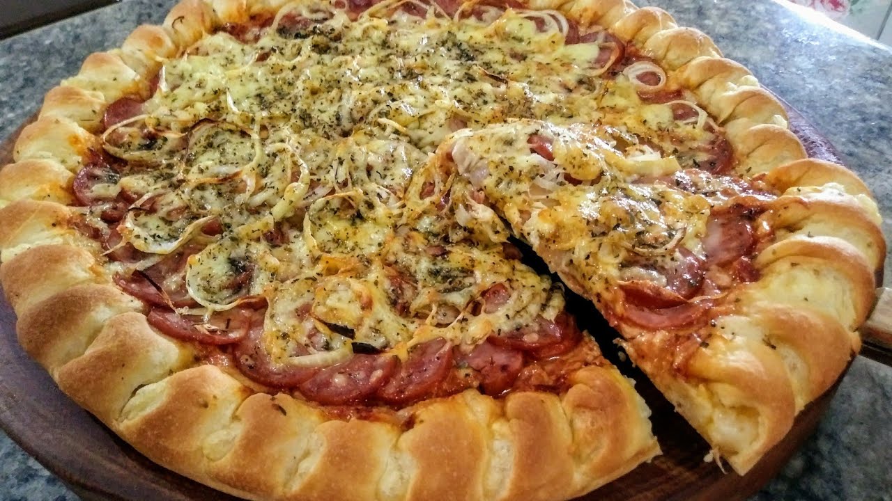 Como fazer pizza de calabresa acebolada?