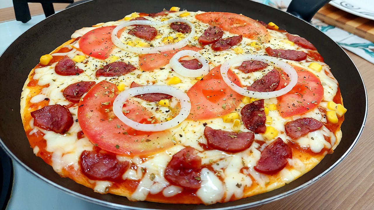 @tatamedeios preparou esta perfeição de pizza de mandioca na frigideira