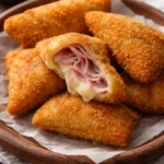 Risoles de queijo e presunto super recheado e crocante por fora